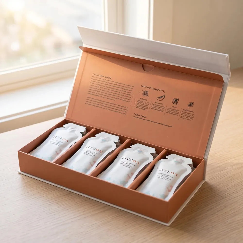 The LiveOn box open, showing the sachets in their copper tray